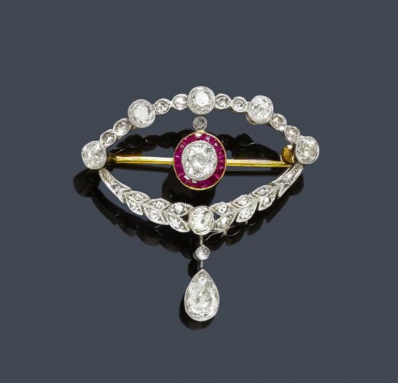 Appraisal: A DIAMOND AND RUBY BROOCH circa Platinum on yellow gold