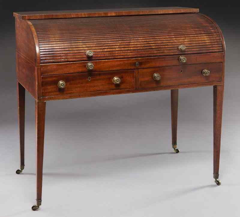 Appraisal: Georgian mahogany roll top desk the slide out gilt tooled