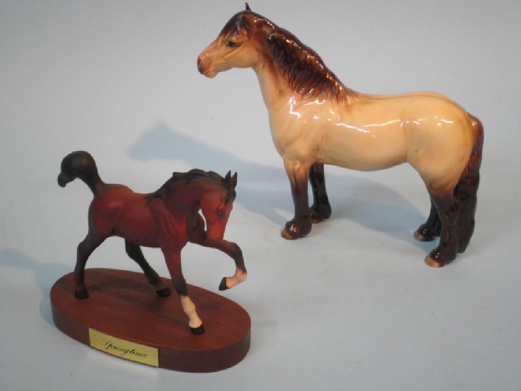 Appraisal: A Beswick Highland pony Mackionneach no and a Beswick matt