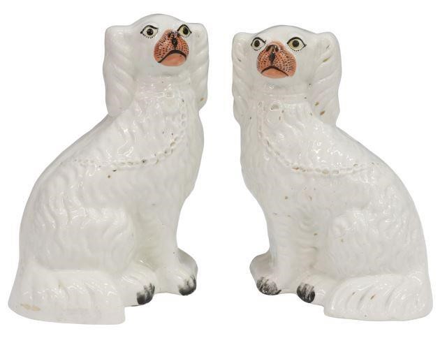 Appraisal: pair English Staffordshire mantel dogs th c seated spaniels with