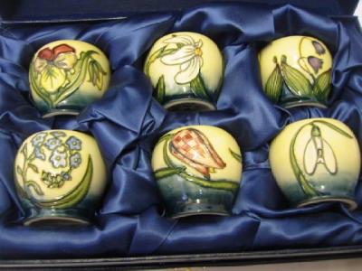 Appraisal: A SET OF SIX MODERN MOORCROFT EGG CUPS dated patterns