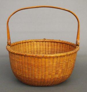 Appraisal: Nantucket Lightship basket A late th century Nantucket Lightship basket