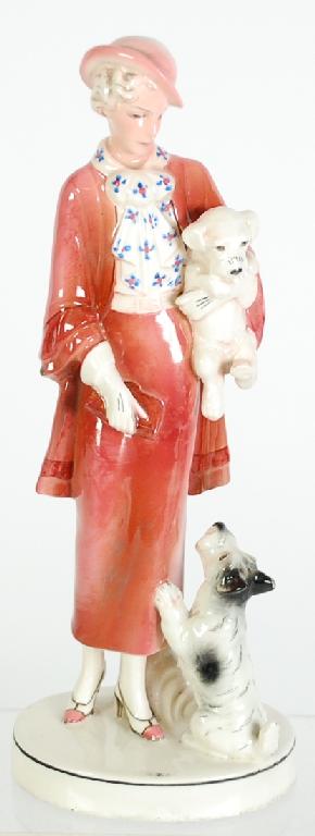 Appraisal: ART DECO KATZHUTTE POTTERY FIGURED LADY modelled standing wearing pink