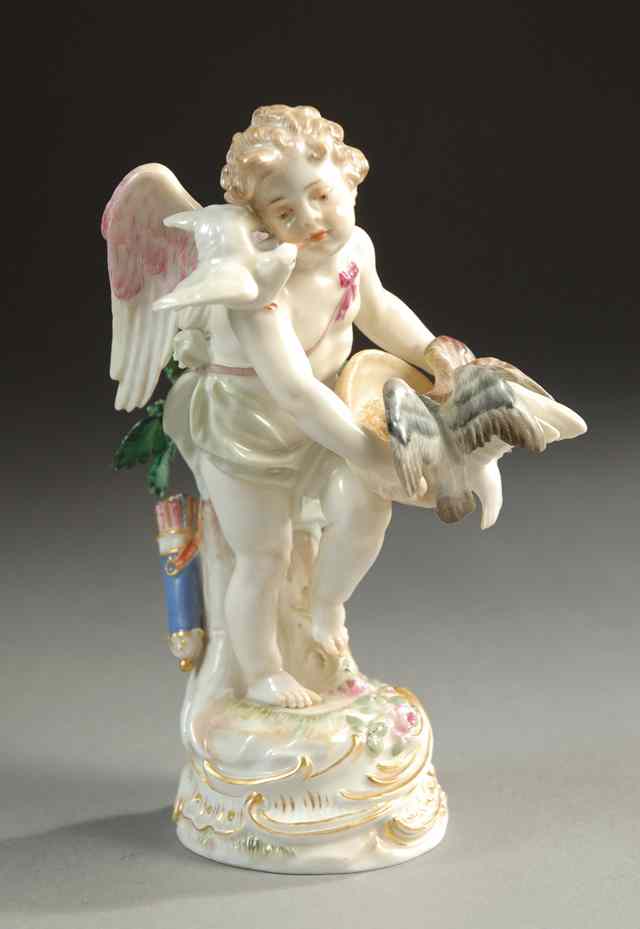 Appraisal: MEISSEN PORCELAIN FIGURE winged cherub holding pan feeding pigeons Hand