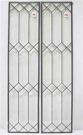 Appraisal: A PAIR OF BEVELED AND LEADED GLASS WINDOW PANELS American