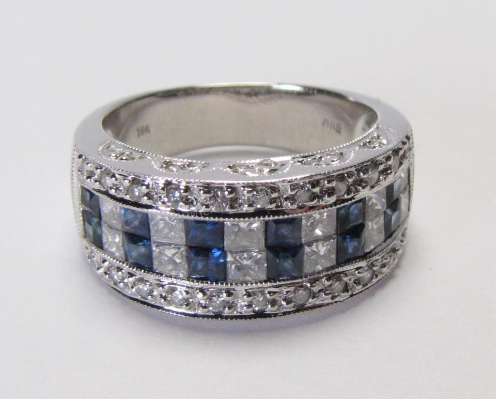 Appraisal: An K white gold band with twenty-two round brilliant cut