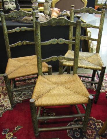 Appraisal: Three primitive paint decorated chairs with ladder back and rush