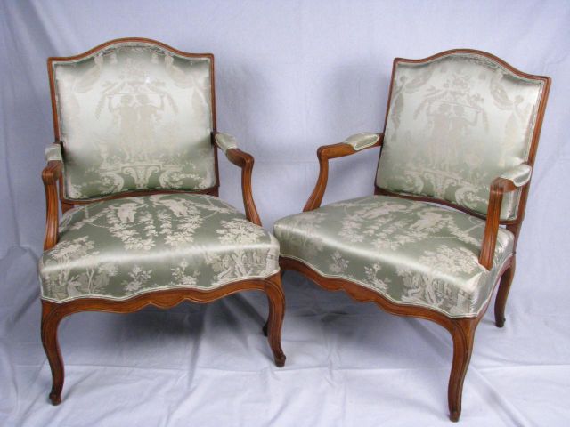 Appraisal: Pair of French style arm chairs circa 's newer silk