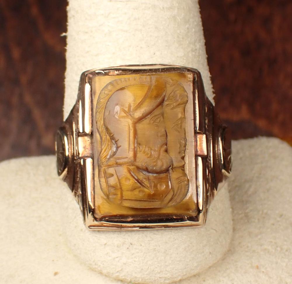 Appraisal: MAN'S TIGER'S EYE AND TWO-TONE GOLD RING The k yellow