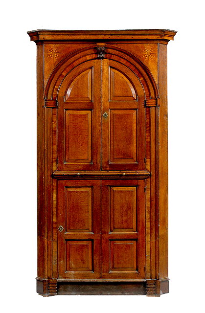 Appraisal: A GEORGE III OAK AND MAHOGANY BANDED CORNER CUPBOARD the