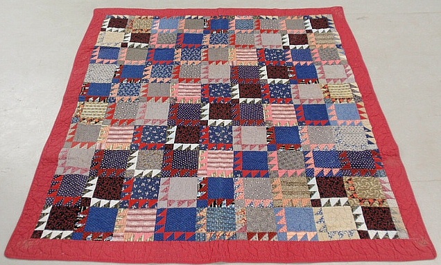 Appraisal: - Colorful pieced block pattern quilt with red border x