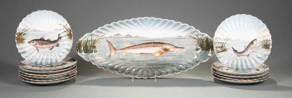 Appraisal: Continental Polychrome and Gilt Porcelain Scalloped Rim Fish Service marked