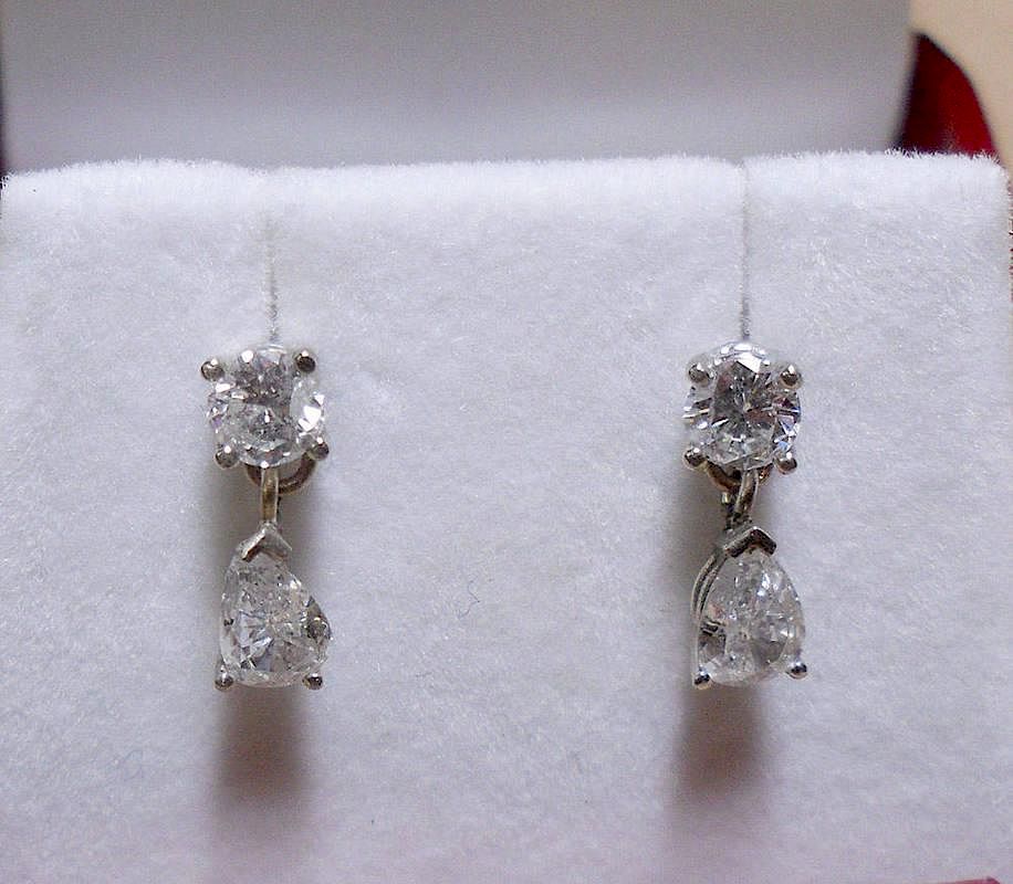 Appraisal: Diamond Drop Earrings K marked white gold earrings containing round