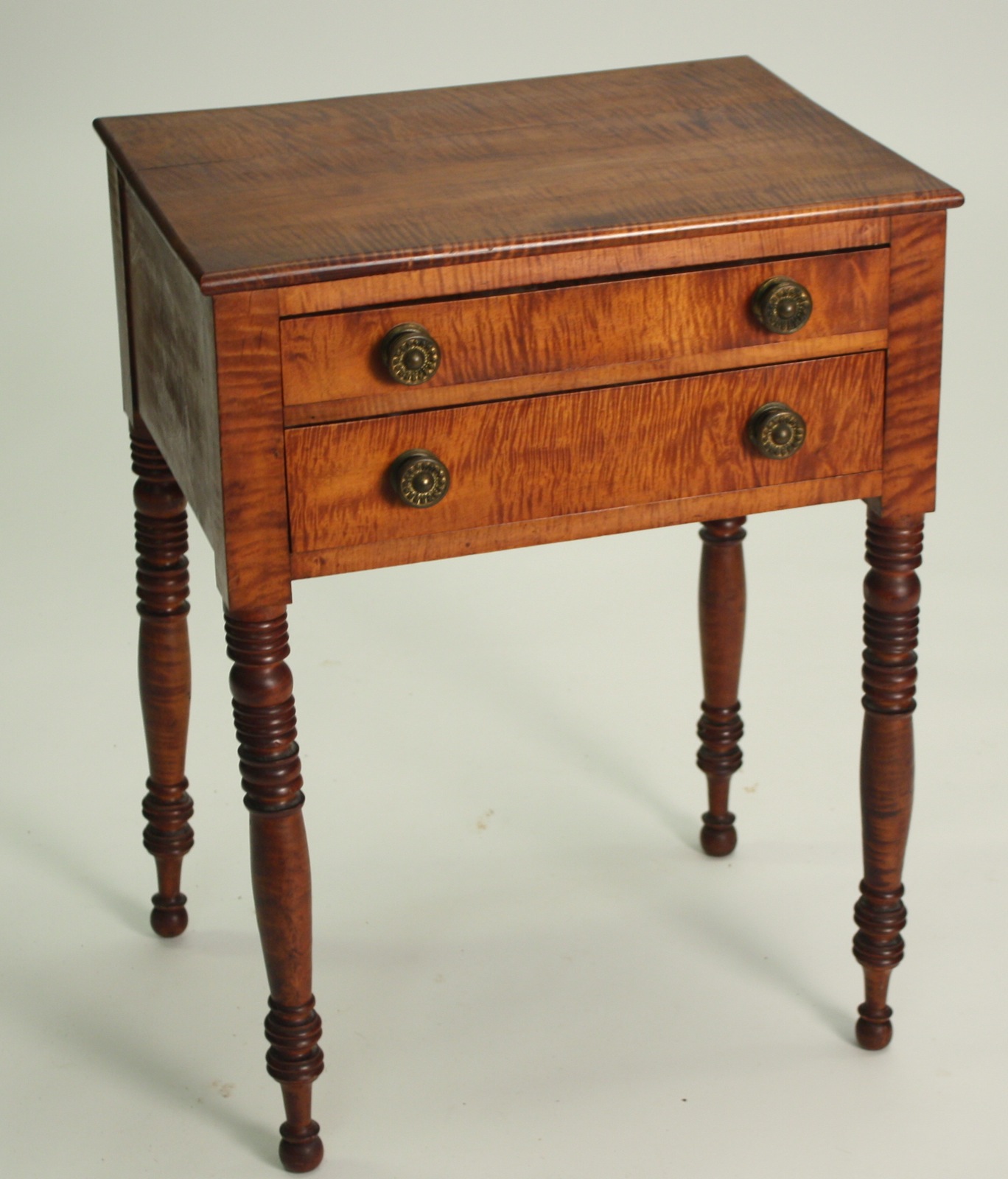 Appraisal: ANTIQUE AMERICAN TWO-DRAWER STAND Circa In exceptional tiger maple Period