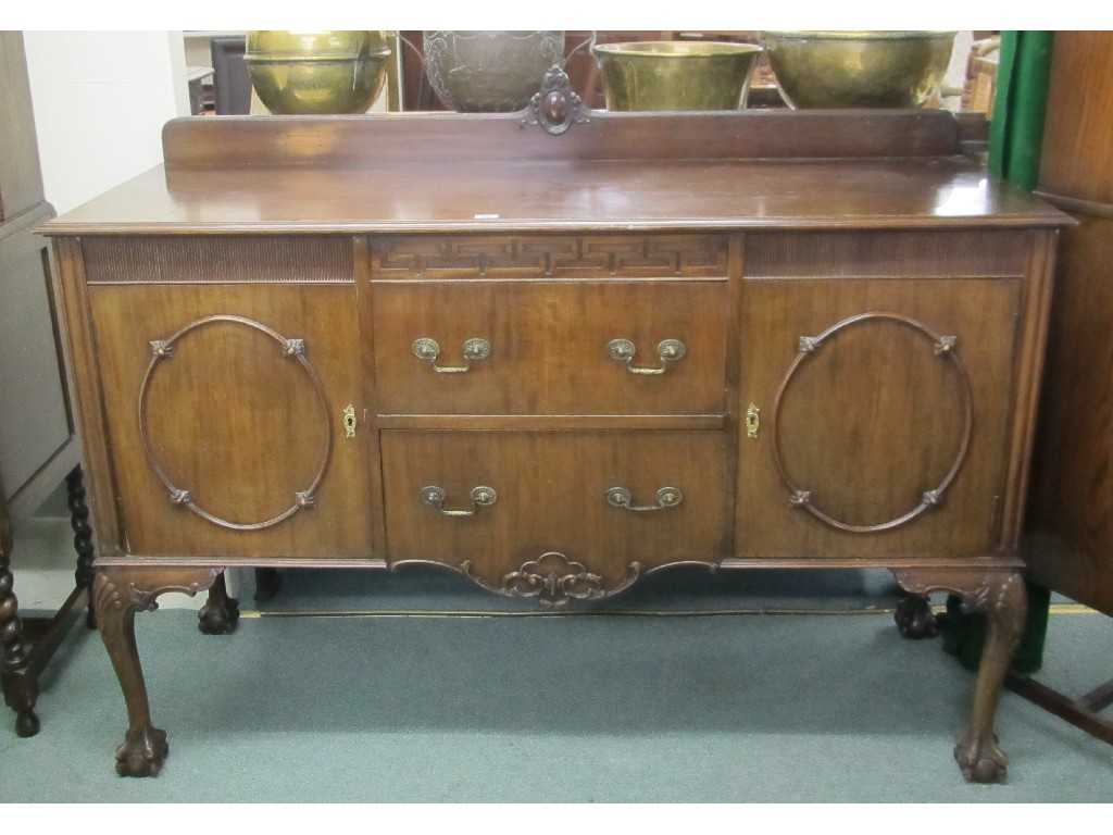 Appraisal: Mahogany sideboard raised on ball and claw supports