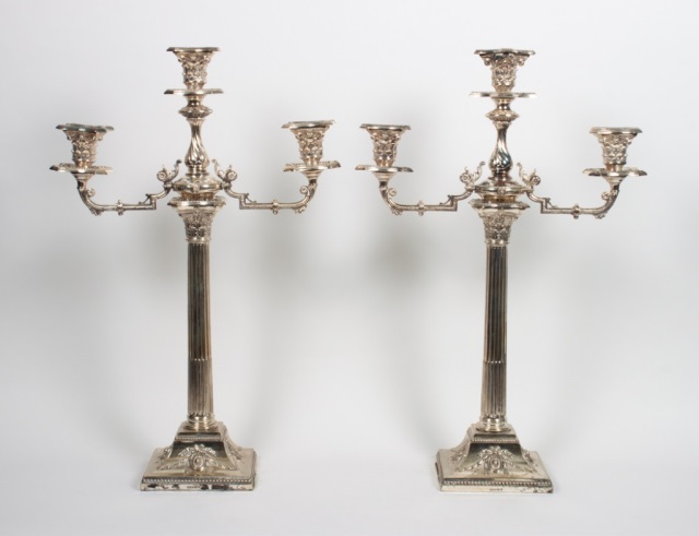 Appraisal: Pair of Holmes Edwards silver-plated candelabra Corinthian columnar candlesticks with