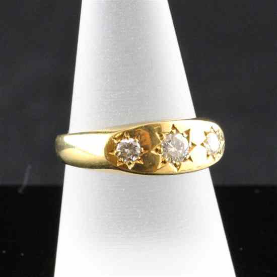 Appraisal: An ct gold three stone gypsy set diamond ring size