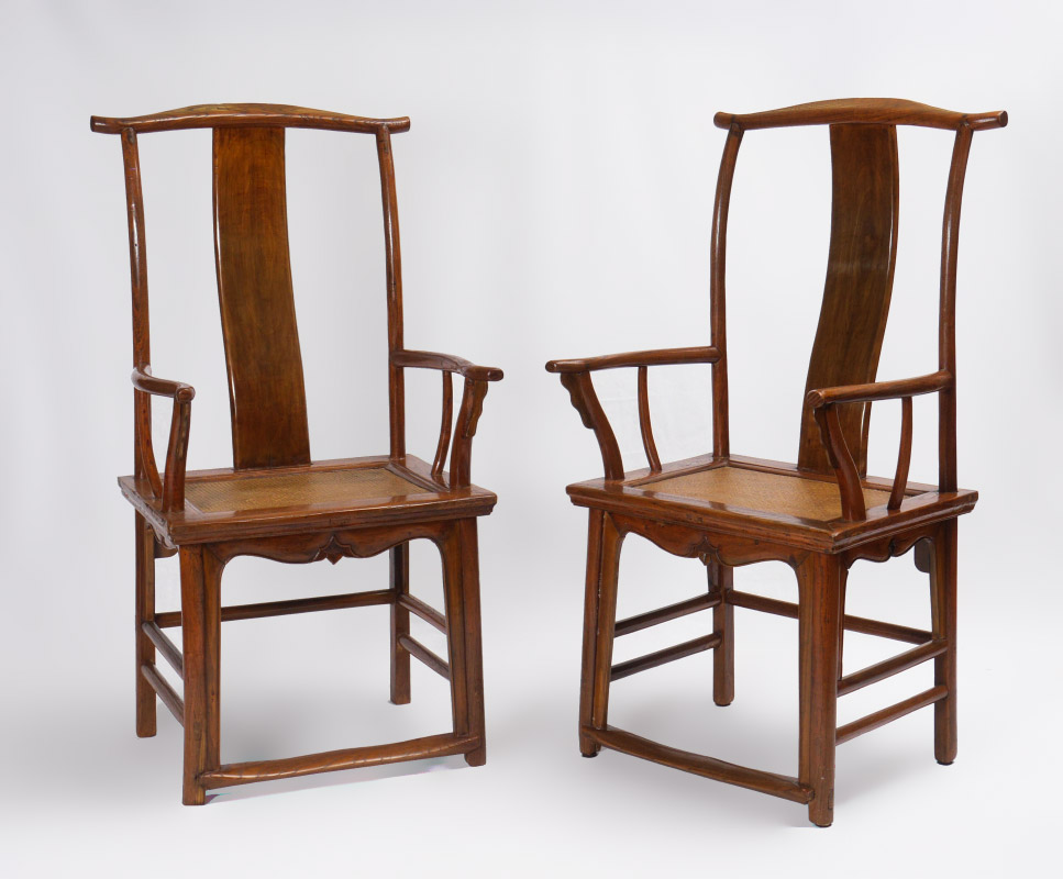 Appraisal: PAIR CHINESE ELMWOOD YOKE BACK CHAIRS Yoke top rail shaped