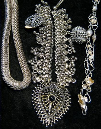 Appraisal: Group of miscellaneous silver jewelryThree silver necklaces of varying form