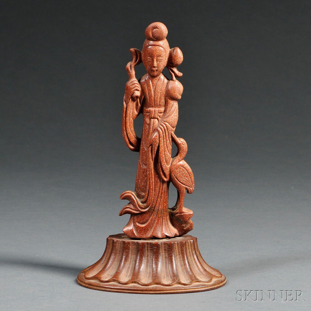 Appraisal: Carved Goldstone Figure of a Woman China standing with a