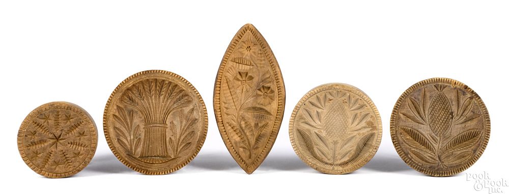 Appraisal: Five carved butterprints Five carved butterprints th c to include