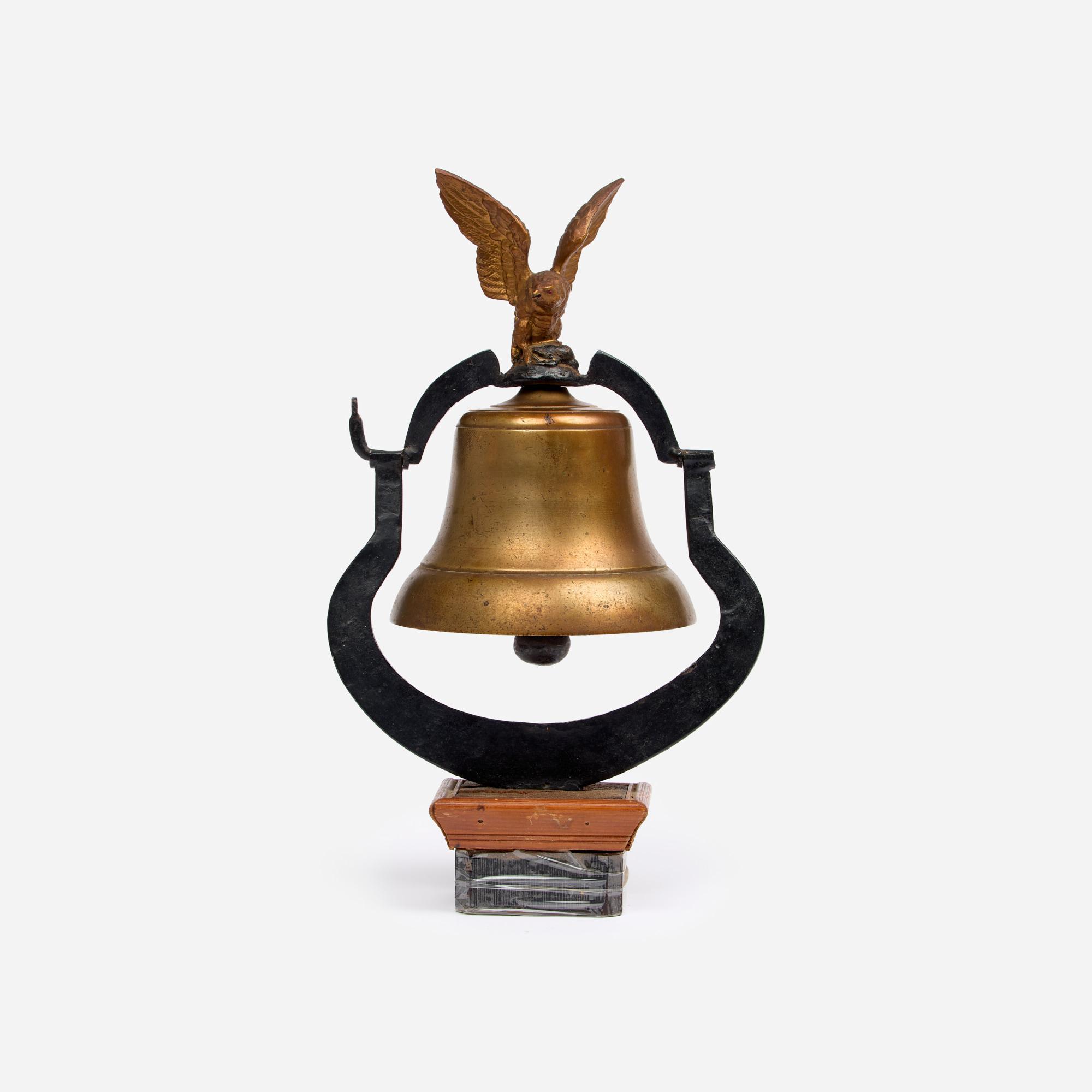 Appraisal: ANTIQUE YOKE BELL WITH EAGLE FINIAL An antique brass bell