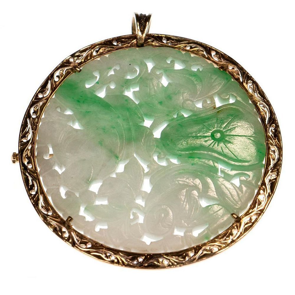 Appraisal: Jade diamond and k gold pendant-brooch the jade disk carved