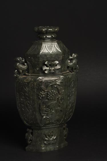 Appraisal: A FINE CHINESE SPINACH-GREEN JADE VASE of flattened baluster form