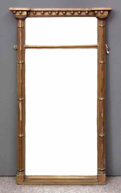 Appraisal: A th Century gilt rectangular pier glass of Regency design