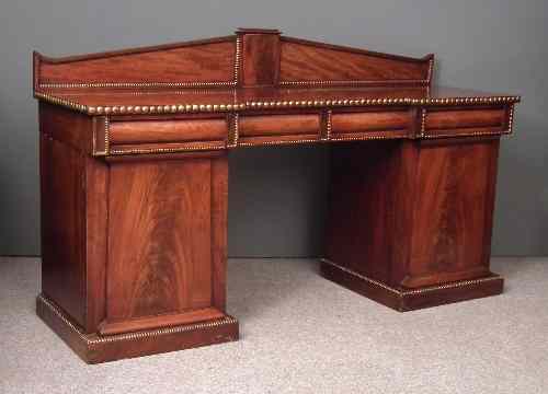 Appraisal: A William IV figured mahogany break-front pedestal sideboard of 'Irish'