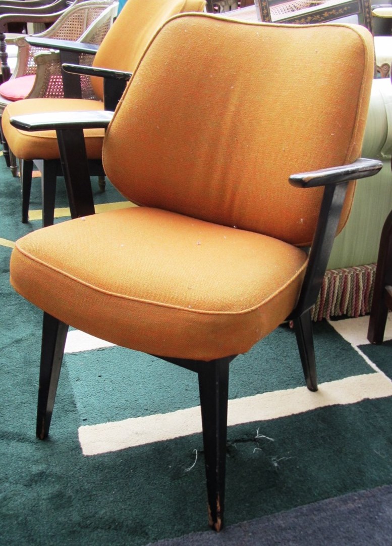 Appraisal: A pair of th century ebonised armchairs on tapering square