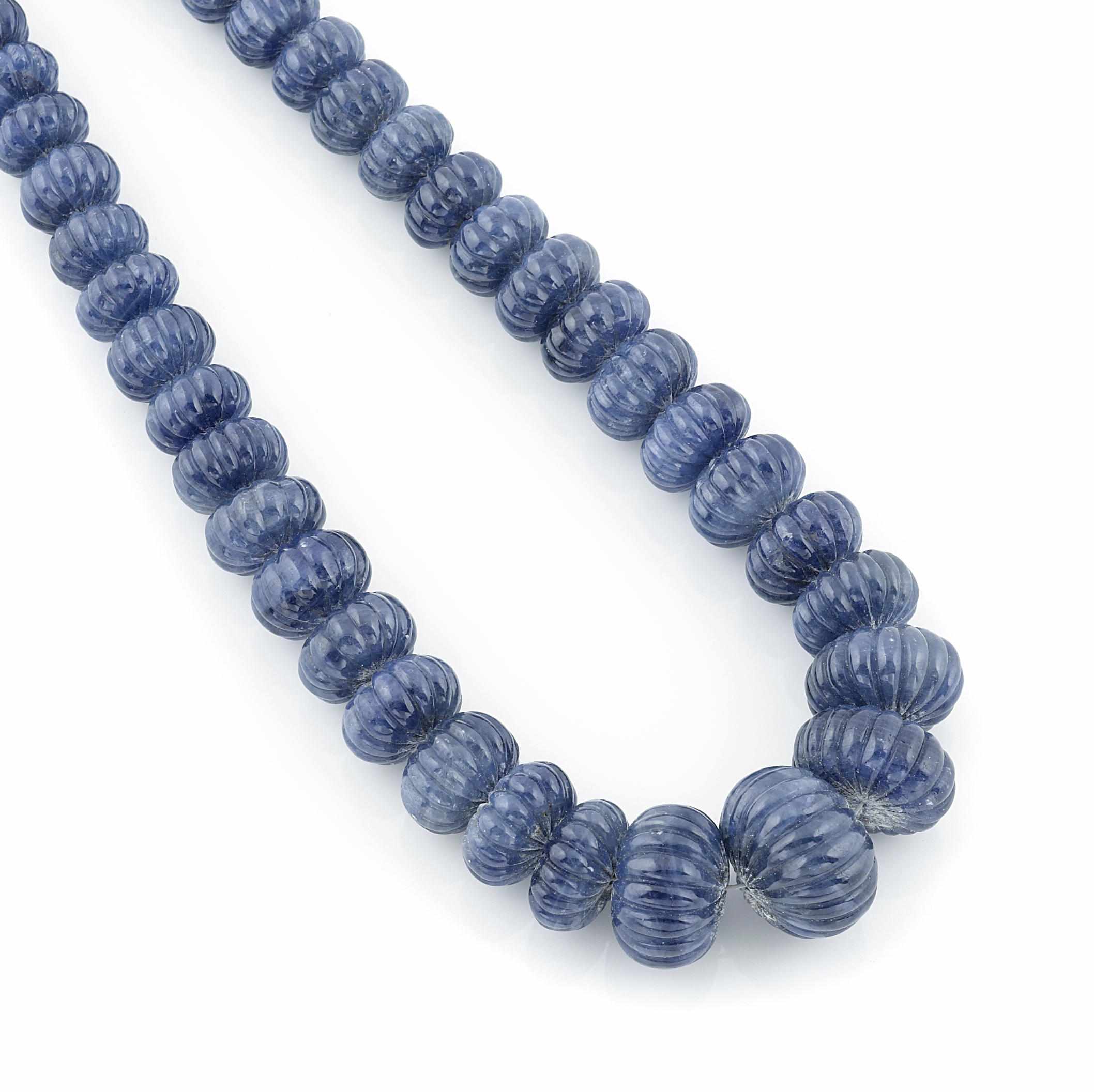 Appraisal: A blue sapphire bead graduated necklace sapphire weighing approximately carats