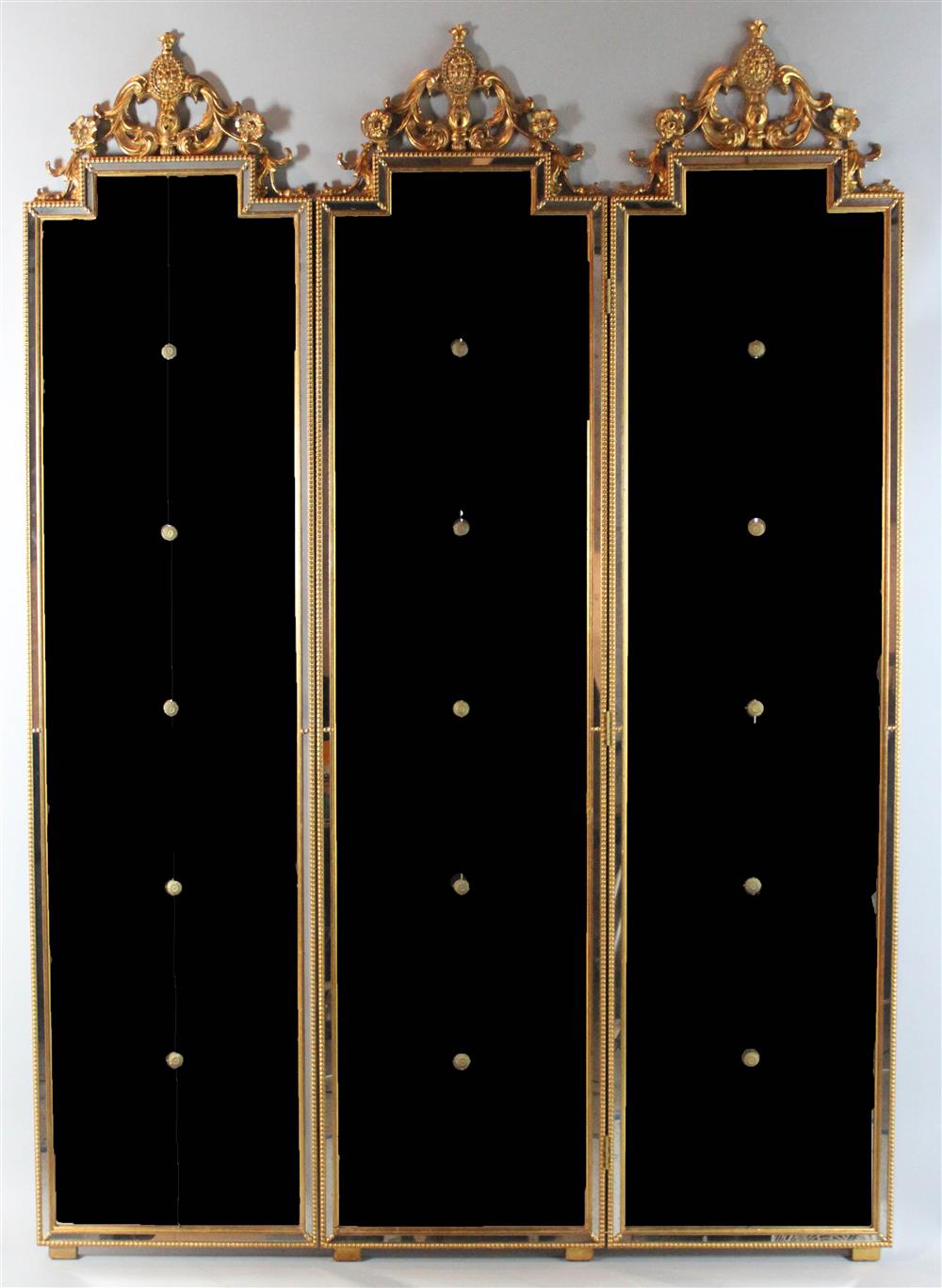 Appraisal: THREE-PANEL GILTWOOD AND MIRRORED FOLDING SCREEN each of the panels