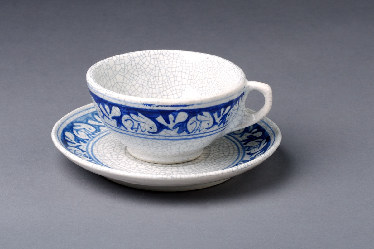 Appraisal: DEDHAM POTTERY 'RABBIT TWO EAR ' PATTERN TEACUP AND SAUCER