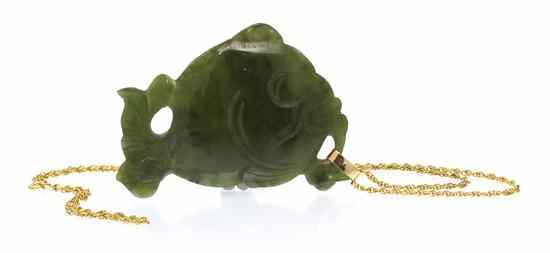 Appraisal: A Nephrite Jade Pendant engraved in a fish motif suspended