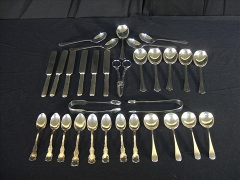 Appraisal: ASSORTMENT OF SILVER AND PLATED CUTLERY Including ten plated large