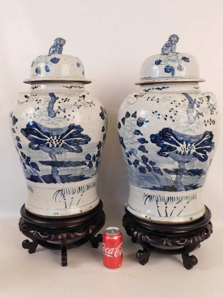 Appraisal: PAIR ANTIQUE CHINESE TEMPLE URNS Pair th century Chinese blue