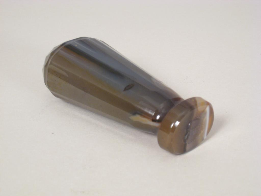 Appraisal: A large hardstone Seal of faceted banded form in