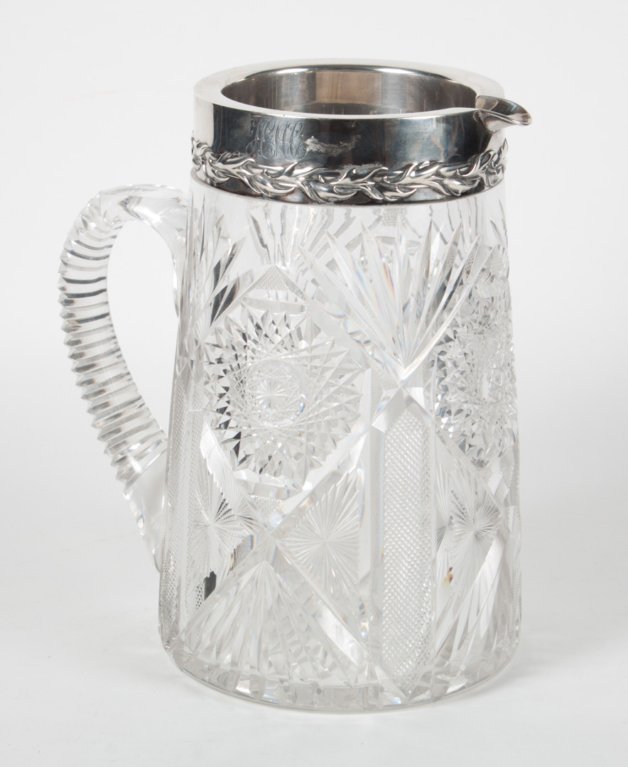 Appraisal: Sterling mounted brilliant cut glass pitcher in H Condition Monogrammed