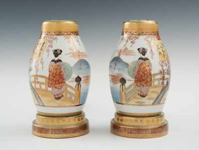 Appraisal: A Pair of Kutani Geisha Boudoir Lamps The circular porcelain