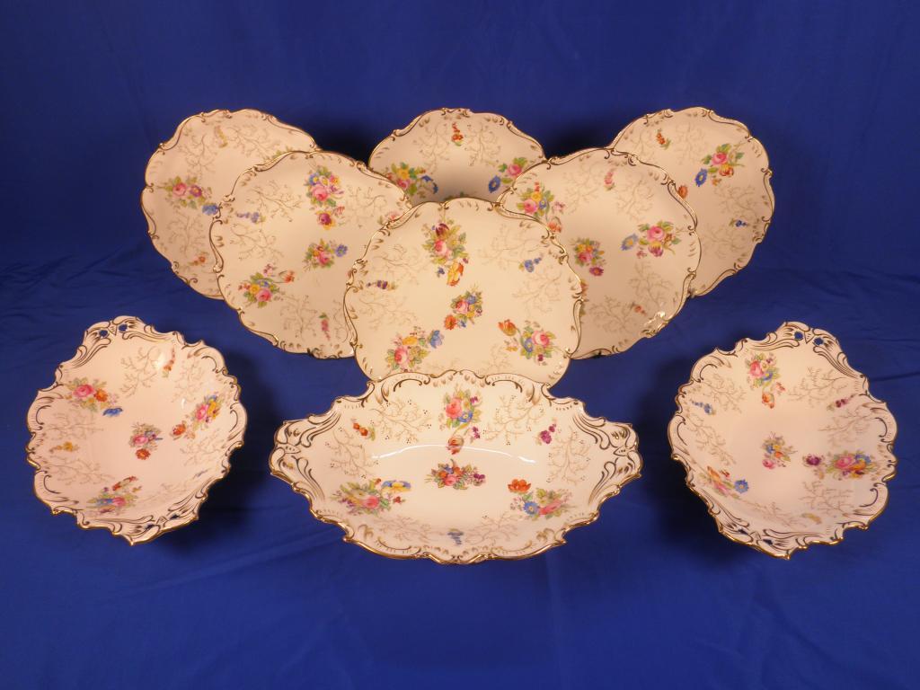 Appraisal: An early thC Coalport dessert service printed and painted with