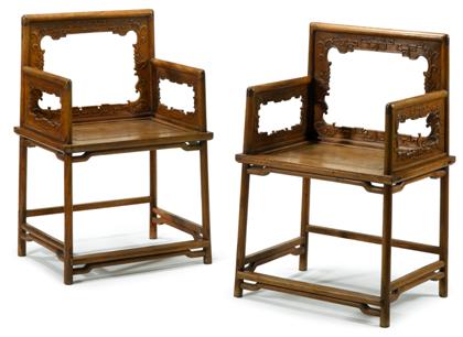 Appraisal: Pair of Chinese carved huanghuali square back chairs The rounded