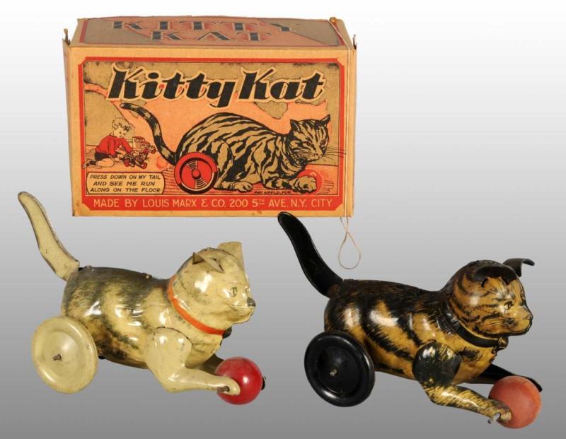 Appraisal: Lot of Tin Marx Kitty Kat Toys Description American Includes