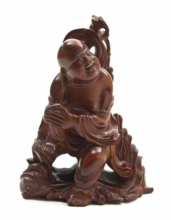 Appraisal: A Chinese Hardwood Carving of a Hotei or Happy Buddha