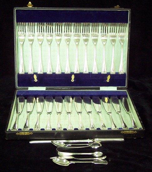 Appraisal: A cased set of fish knives and forks Walker and