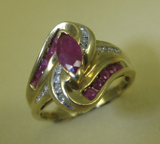 Appraisal: RUBY DIAMOND AND FOURTEEN KARAT GOLD RING set with one