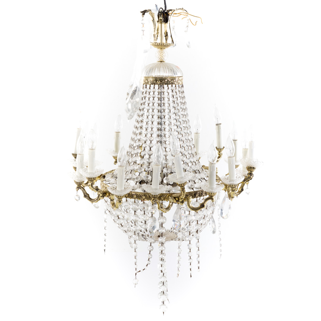 Appraisal: Neoclassical style brass and crystal chandelier light with drop prisms