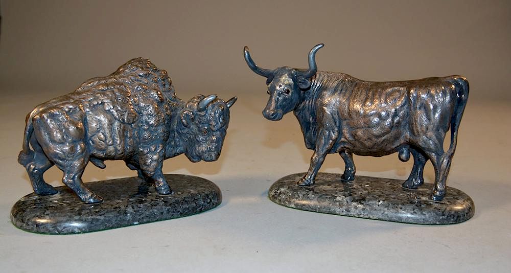 Appraisal: Two sterling figures of a bison and a steer mounted