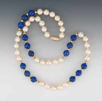 Appraisal: A Pearl Lapis and Gold Bead Necklace Hand knotted necklace