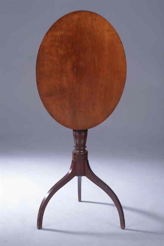 Appraisal: TENNESSEE FEDERAL FRUITWOOD CANDLESTAND Early th century Oval tilt-top turned